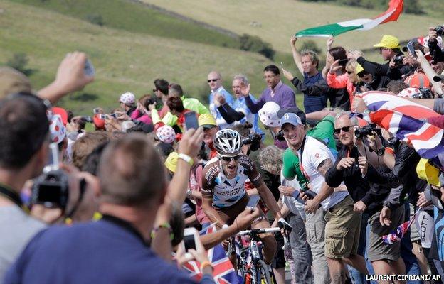 Spectators line the road as France's Blel Kadri climbs in the breakaway group