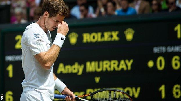 Andy Murray's defence of the Wimbledon title ended at the quarter final stage against Grigor Dimitrov