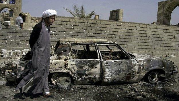 Qais al-Khazali inspects damage after clashes in Najaf, Iraq - 26 May 2004