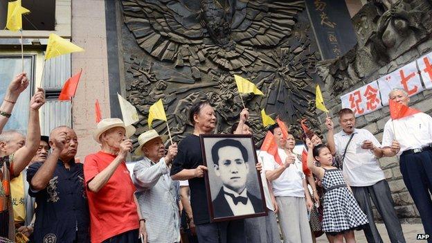 Chinese citizens gather to remember victims during the bombing of Chongqing and commemorate the 77th anniversary of the official start of war with Japan in southwest China's Chongqing municipality on 7 July, 2014