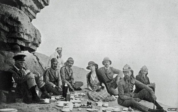 Gertrude Bell (centre) picnicking with King Faisal of Iraq (second from right) in 1922