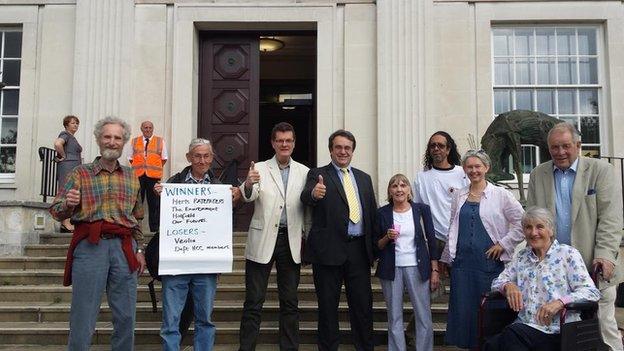 Protesters outside Hertfordshire County Council offices