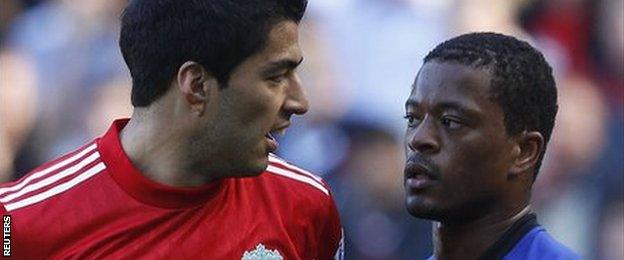 Luis Suarez and Patrice Evra