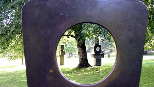 A series of sculptures by Barbara Hepworth called Family of Man in the open air at the Yorkshire Sculpture Par