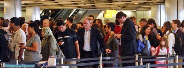 People queuing at Heathrow in 2011