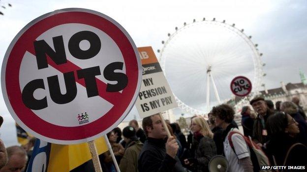 Demonstrators march through the streets of central London, on November 30, 2011, in protest over changes to their pensions