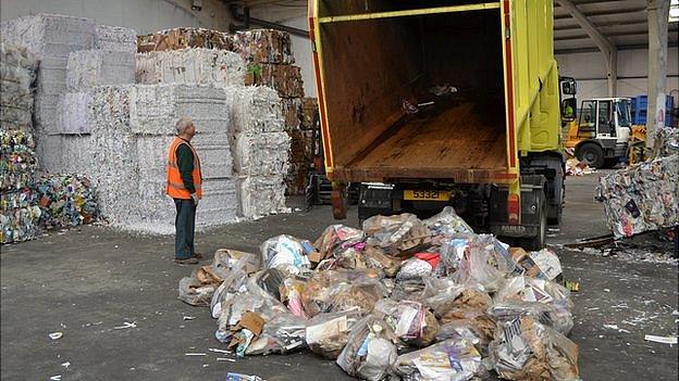 Recyclables being delivered for sorting and bailing before being shipped off island