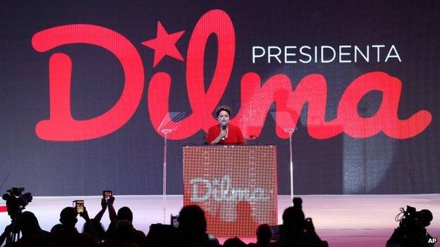 President Dilma Rousseff speaks to supporters at the Workers Party national convention in Brasilia on 21 June, 2014