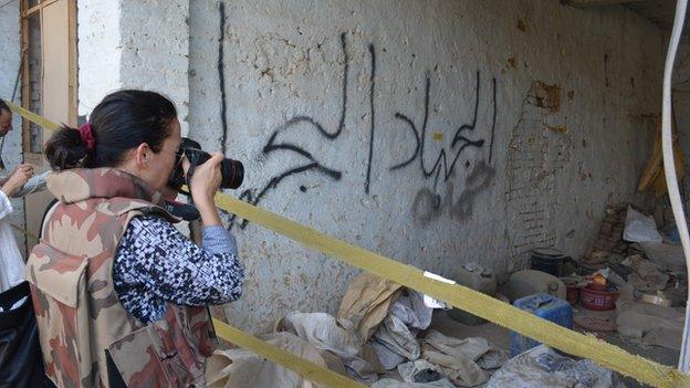 Reporter takes photo of closed off room in Miranshah