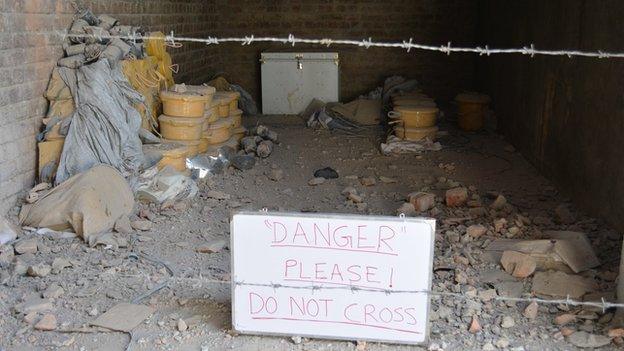 Danger sign leading into closed off room in Miranshah