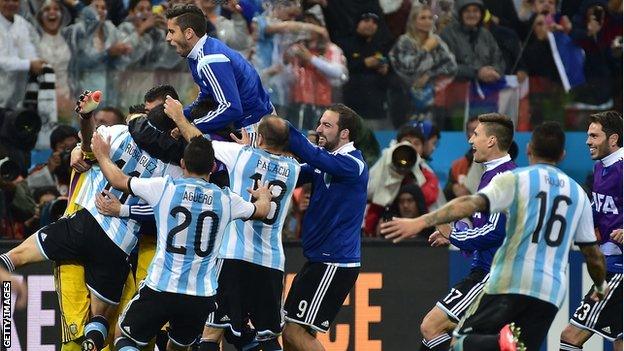 Argentina players celebrate their penalty shootout victory over the Netherlands in the 2014 Fifa World Cup semi-final in Sao Paulo