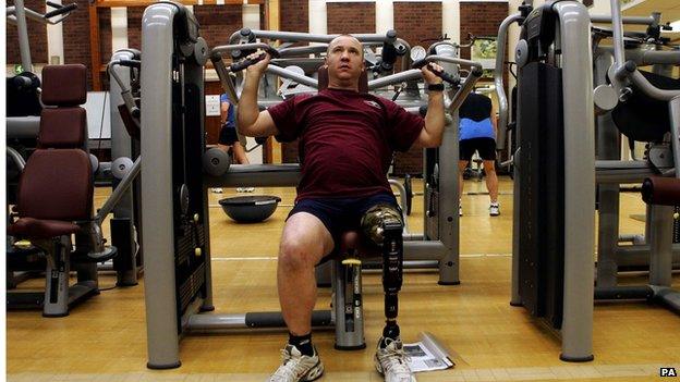 Soldier in one of the gymnasiums at the Headley Court