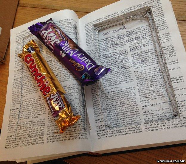 Chocolate bars on book