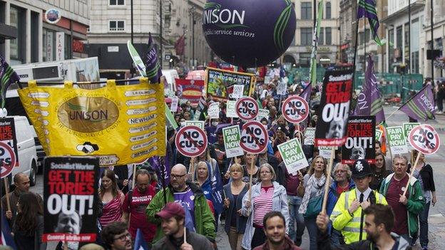 Several hundred workers take part in a rally in central London, July 2014