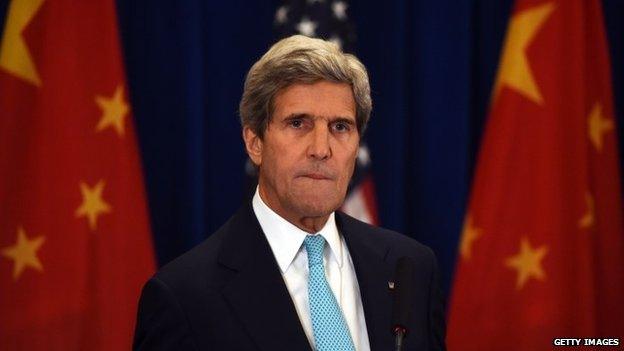 US Secretary of State John Kerry listens to a question at a press conference following the end of talks at the US-China Strategic and Economic Dialogue, in Beijing 10 July 2014