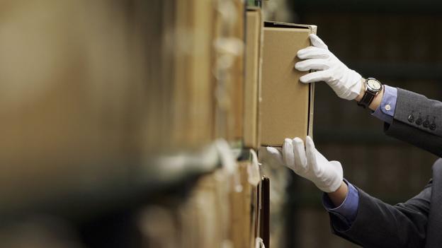 Man removing files from the National Archives