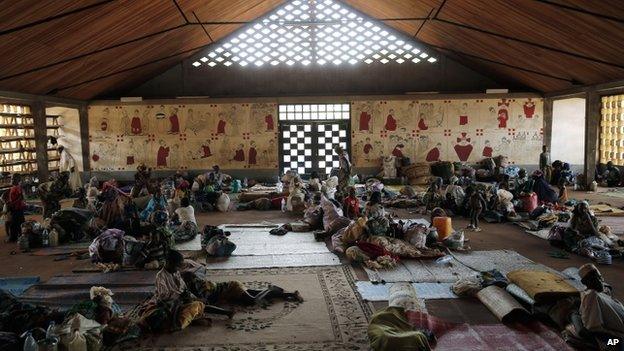 Muslims rest inside the Catholic church in Carnot, Central African Republic - April 2014