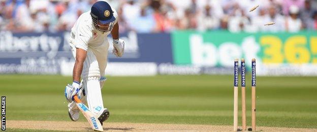 India captain Mahendra Dhoni is run out