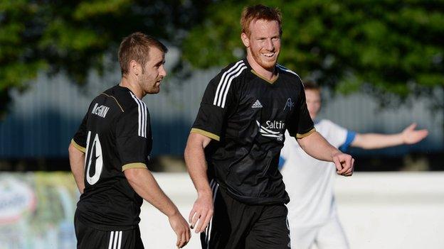 Adam Rooney scored a hat-trick as Aberdeen beat Daugava Riga 3-0