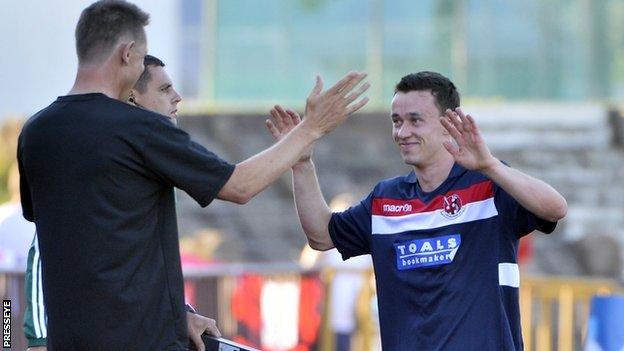 Crusaders boss Stephen Baxter celebrates with Paul Heatley