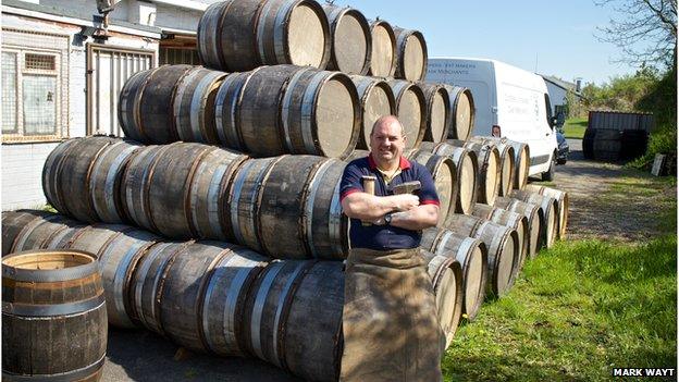 Alastair Simms with his beer barrels