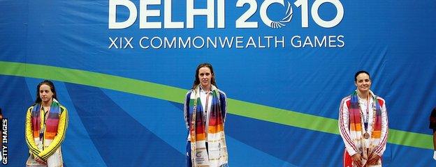 Hannah Miley stands on the podium after her triumph at the Delhi 2010 Commonwealth Games