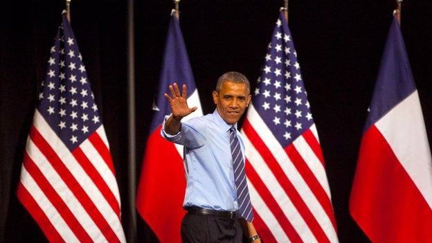 President Obama waves from the stage at a speech in Austin, Texas on 10 July