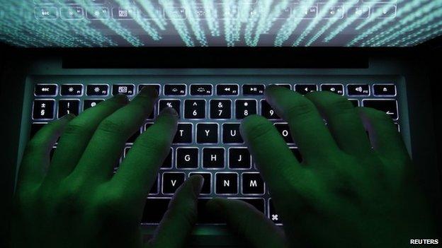 File photo: person typing at computer keyboard