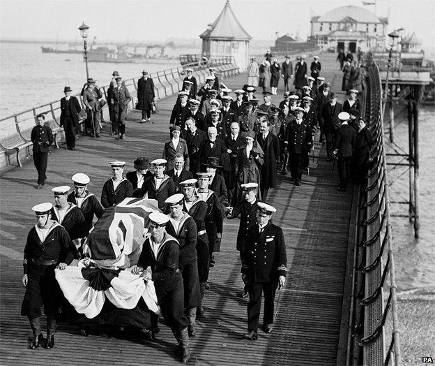 Edith Cavell's coffin is escorted by officers of the Royal Navy