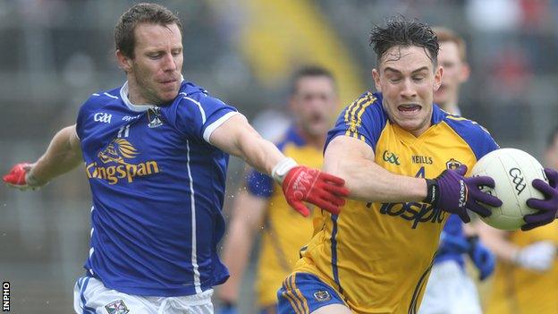 Cavan's Micheal Lyng and Roscommon's Neil Collins