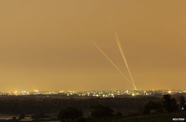 Rockets are fired from the north of the Gaza Strip towards Israel, 12 July