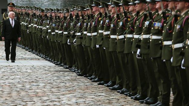 President Michael D Higgins inspects the Guard of Honour during an interfaith service of commemoration at the Royal Hospital Kilmainham.