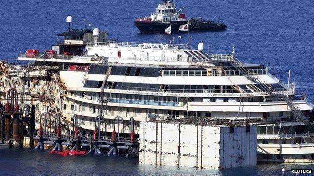 The cruise liner Costa Concordia is seen at Giglio harbour, Giglio Island, 13 July 2014