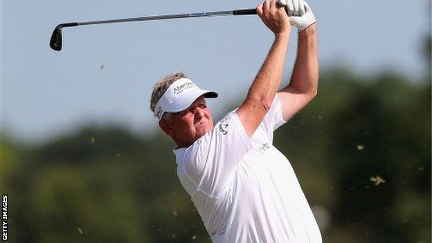 Golfer Colin Montgomerie in action