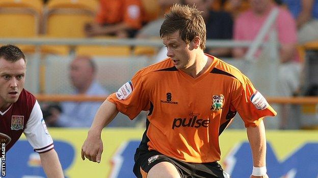 Mark Byrne in action for Barnet