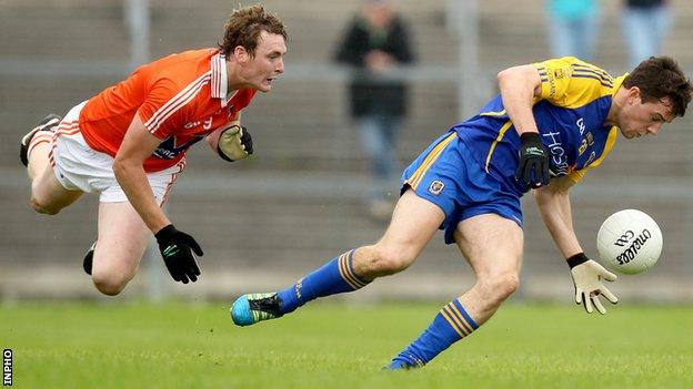 Kieran Toner battles with Neil Collins in the 2012 qualifier