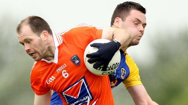 Ciaran McKeever battles with Donie Shine in the 2012 qualifier