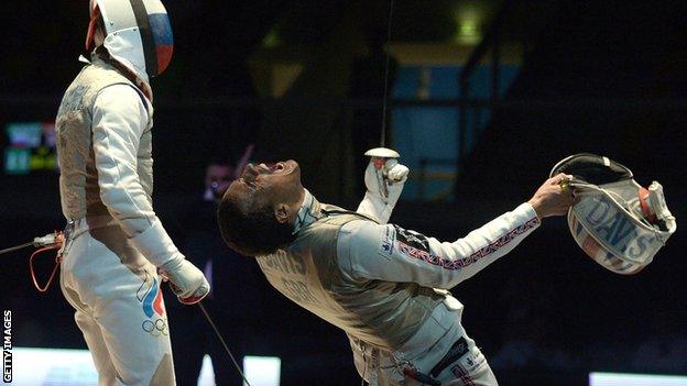 Jamie Davis (right) celebrates after beating Russia's Alexey Cheremisinov (left) during the men's individual foil final match at the European Championships last month