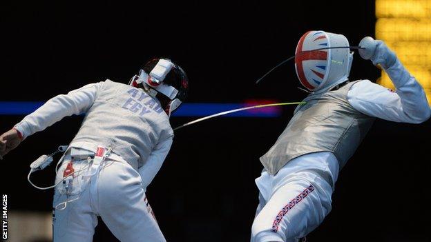 James Davis (right) in action against Egypt's Tarek Ayad at London 2012