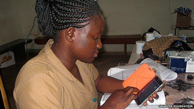 A community health worker uses the new Android-based MOTECH app