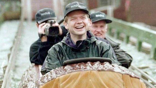 William Hague on a water slide