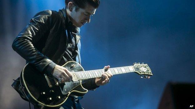 Arctic Monkeys guitarist Alex Turner on stage in Hungary in July 2014