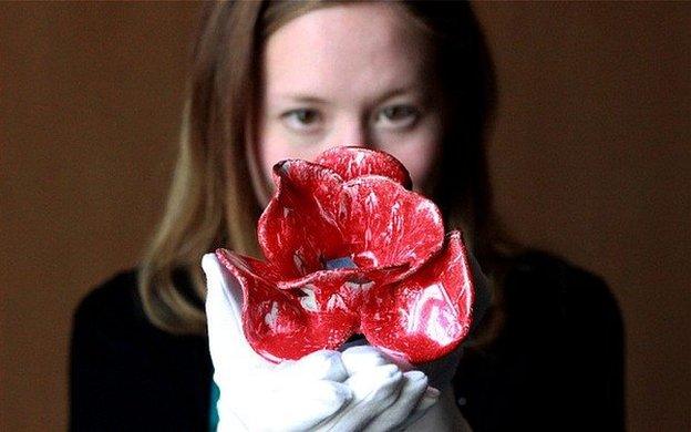 Ceramic poppy created by Paul Cummins Ceramics