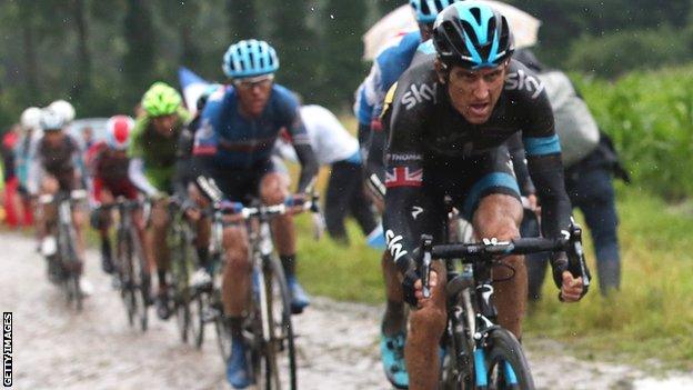 Geraint Thomas rides hard on the cobbles