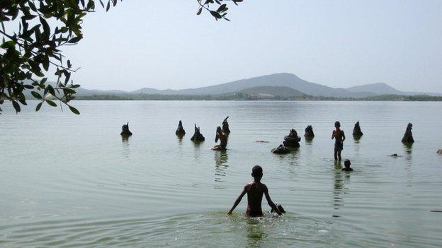 Children bathe in Guantanamo Bay in June 2014