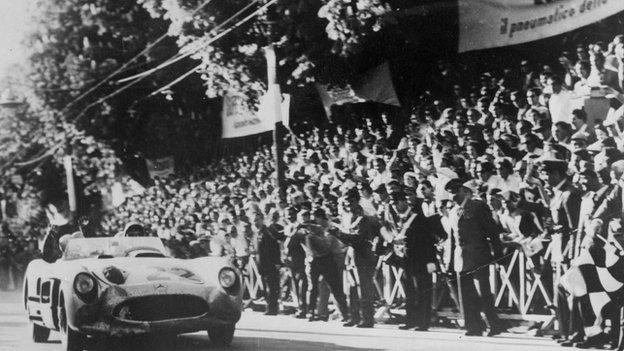 British racing driver Stirling Moss on his way to winning the Italian Mille Miglia Race, setting a new record in May 1955