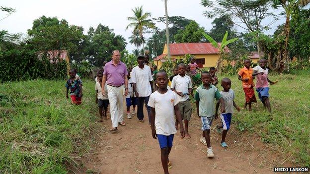 Piot and Mandzomba in Yambuku, February 2014