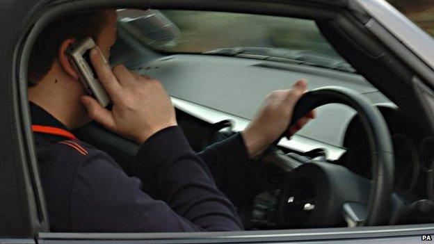 Driver on mobile phone