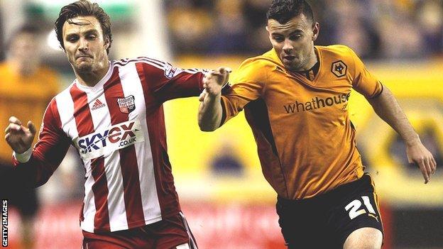 Zeli Ismail (right) in action for Wolves against Sam Saunders Brentford