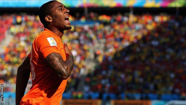 Leroy Fer celebrates scoring for the Netherlands against Chile at the World Cup